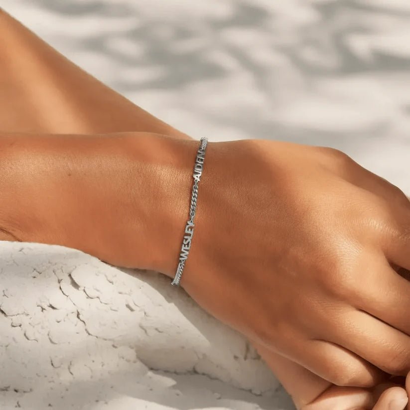 couleur Zilver — Gepersonaliseerde naamarmband met uitgesneden namen